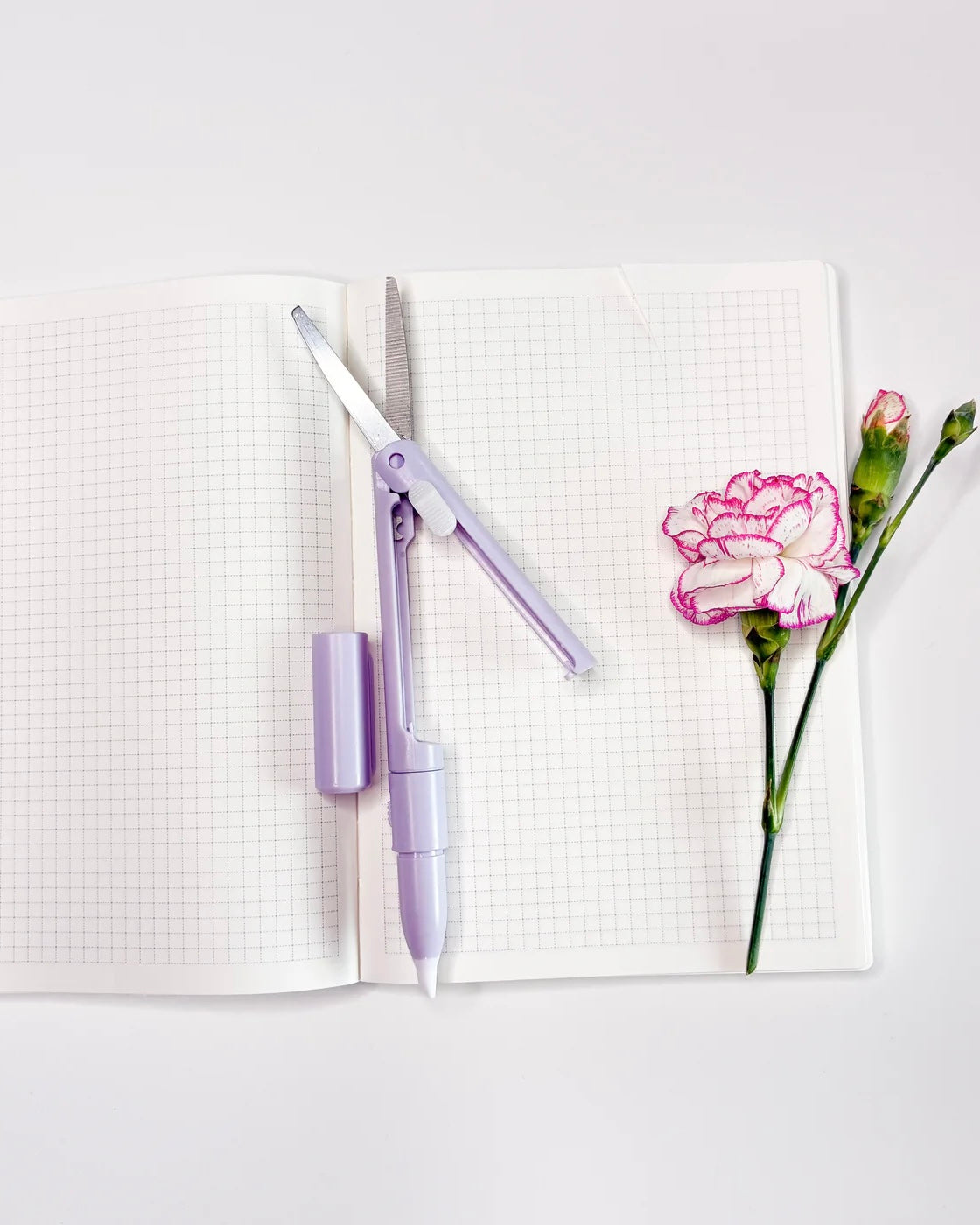 Pen met schaar en mesje