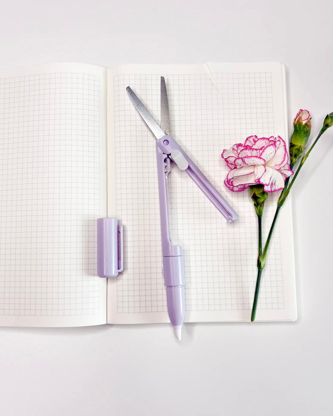 Pen met schaar en mesje