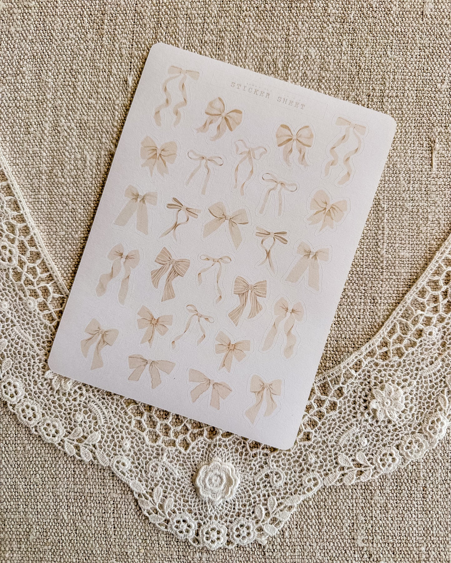 Stickervel | strikjes beige